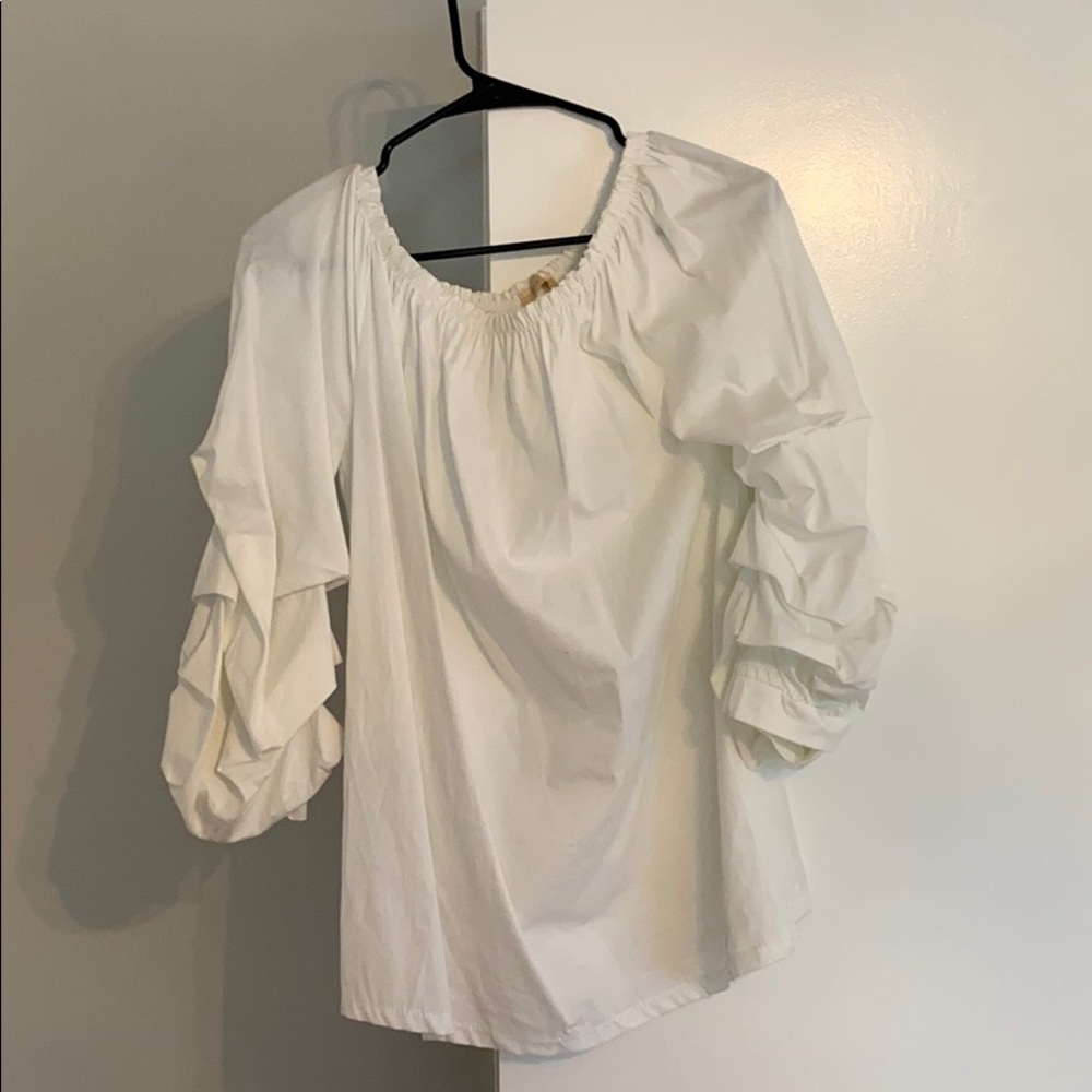 White puffy arm shirt